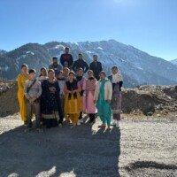 Team and client enjoying Padhri Jot tour in J&K