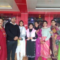 Team members visiting temple together