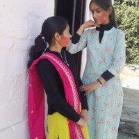People celebrating Holi festival with colors