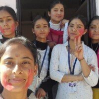People throwing colors during Holi festival